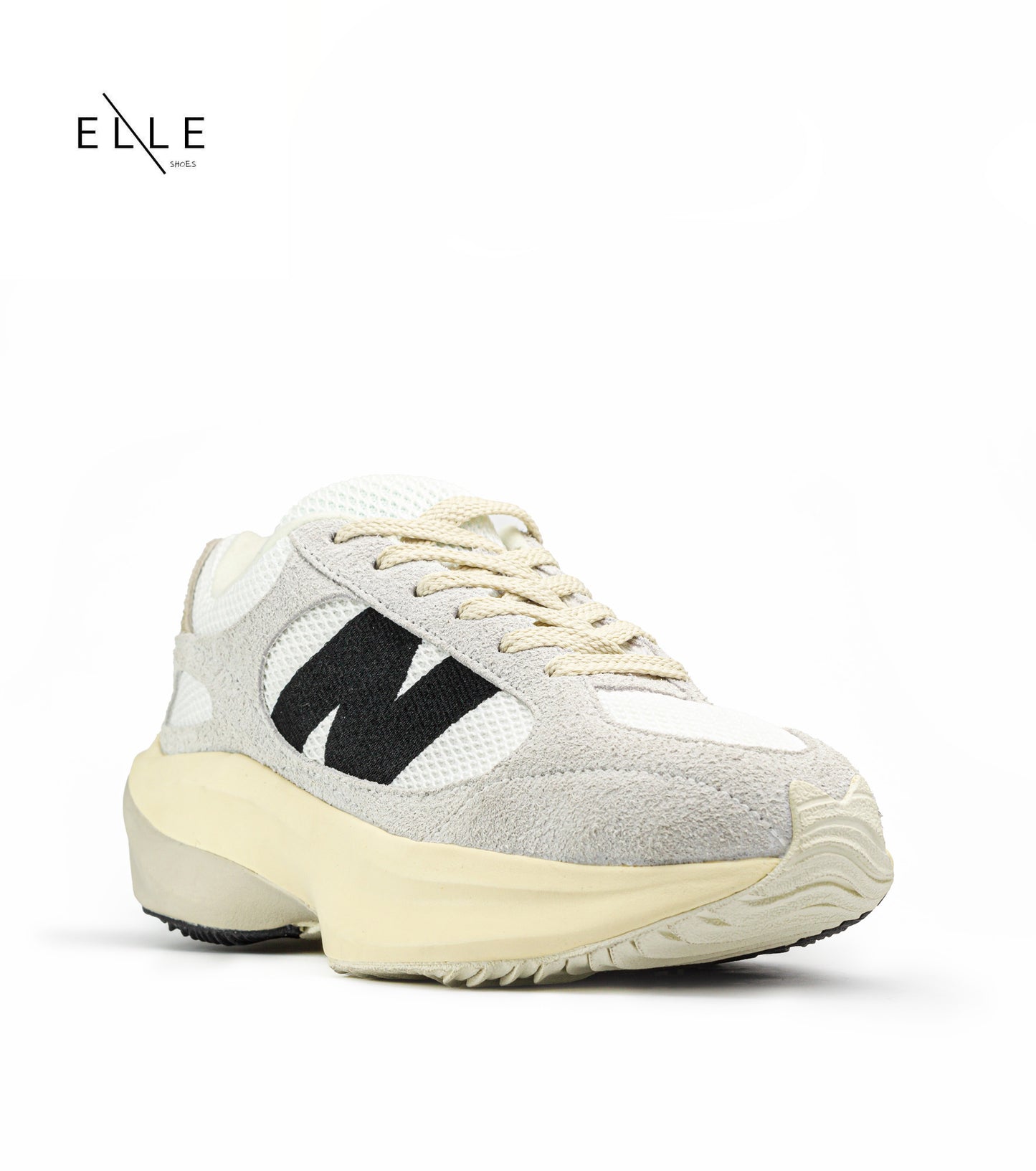 حذاء رياضي "Warped Runner" باللون البيج من NEW BALANCE