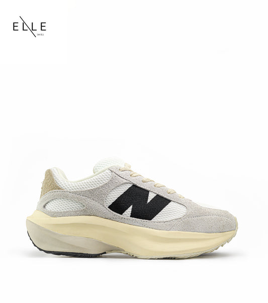 حذاء رياضي "Warped Runner" باللون البيج من NEW BALANCE 